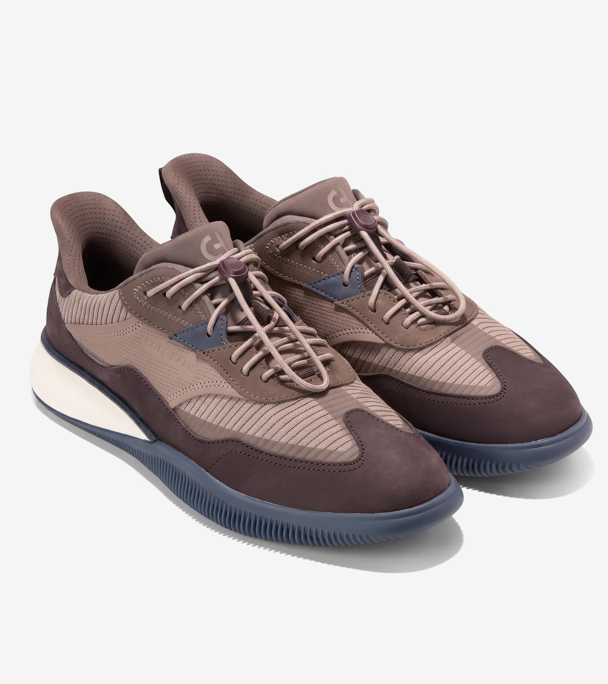 A pair of men's Cole Haan 6.ZEROGRAND sneakers in Irish coffee brown nubuck and truffle mesh, shown at a slight angle.