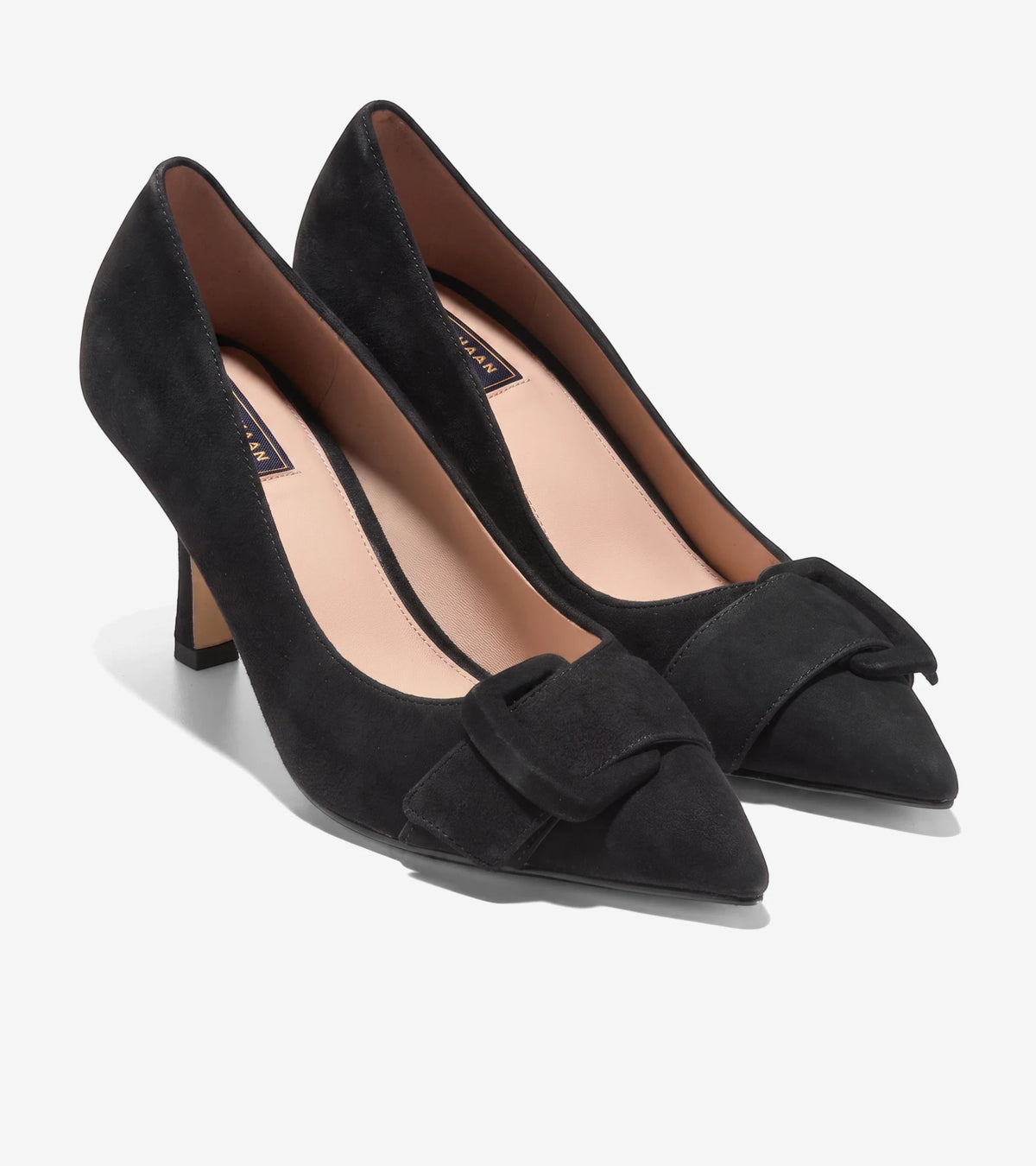 Pair of black suede Cole Haan Fidela buckle pumps with pointed toes and block heels, viewed from a side angle.